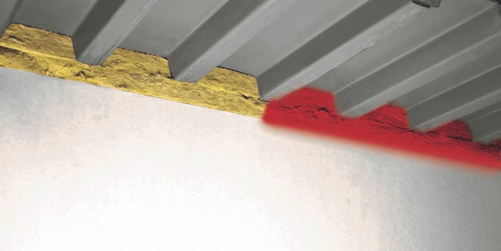 Photo of CFS-BL Firestop blocks being used in a mixed penetration of pipe, cables and a cable tray, then sealed using CFS-F FX Firestop foam. 